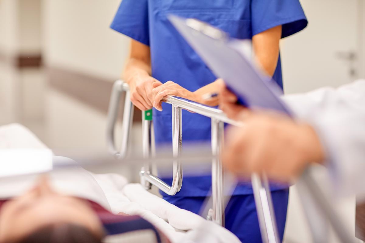 Nurse at patient's beside